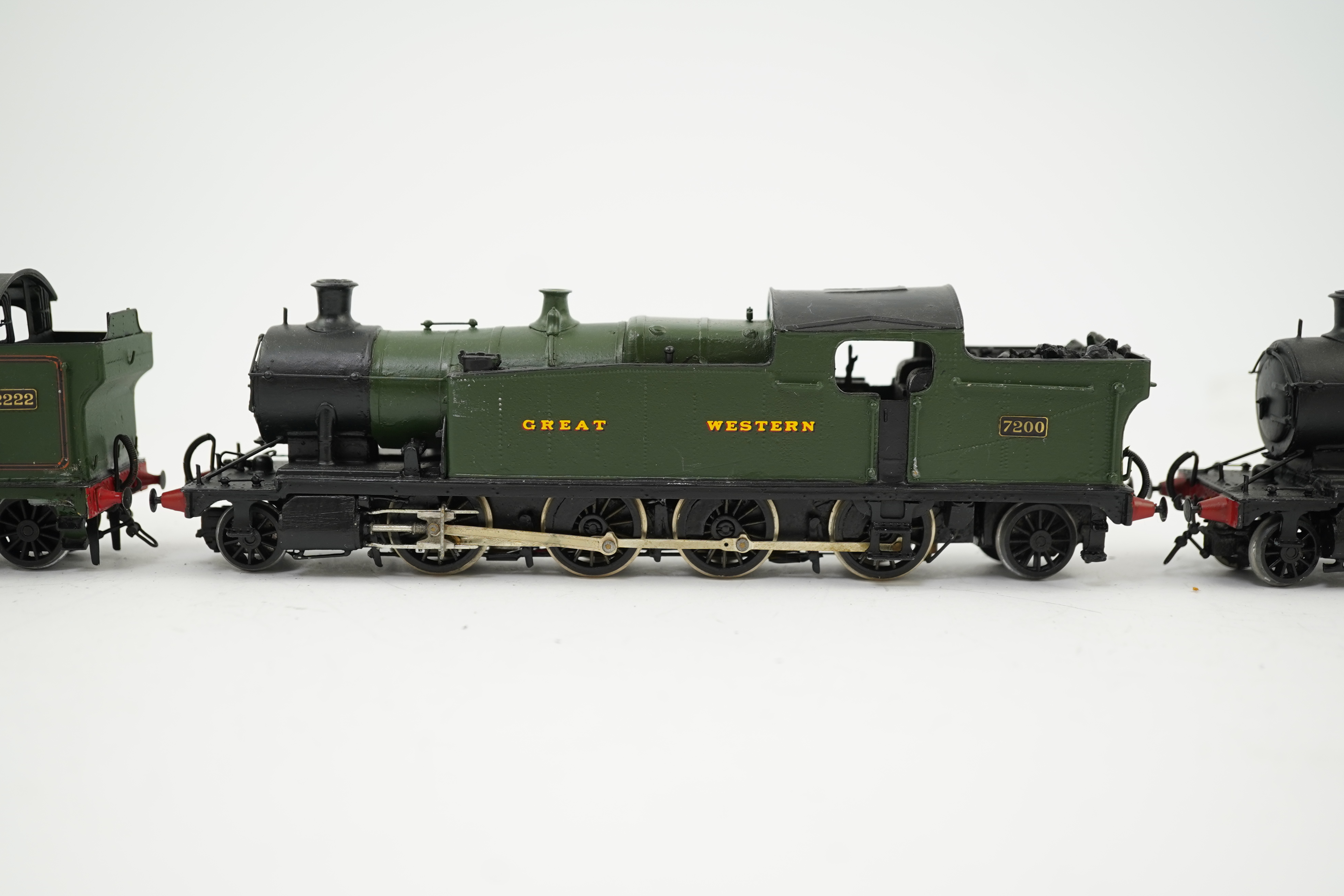 Three 00 gauge kit built GWR tank locomotives, two brass and white metal; a 42xx class 2-8-0T, 4200, together with an 72xx class 2-8-2T, 7200, plus a plastic/resin and metal 22xx class 4-4-2T, 2222, all constructed, pain